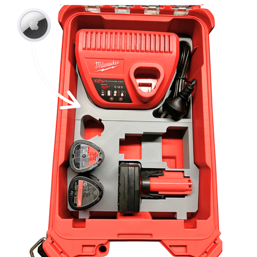 Red Milwaukee tool kit with battery and accessories on a white background