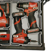 Milwaukee power tool set with drill and impact driver in a case