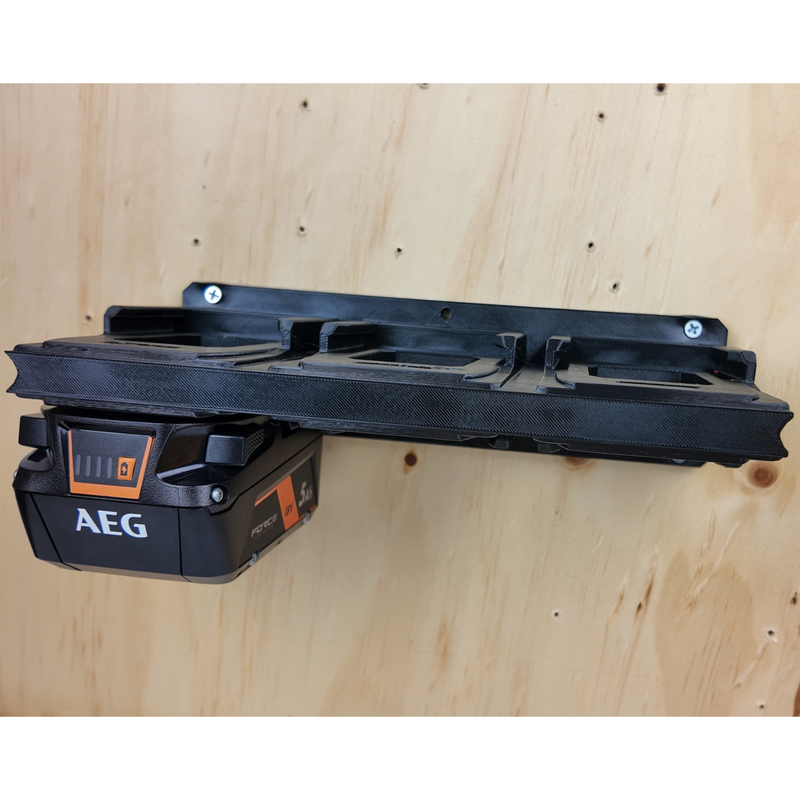 AEG 18V batteries stored in a row on the 3D printed wall rack