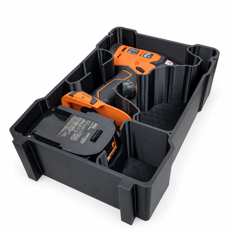 AEG A18IDB30 impact driver and battery insert for Milwaukee PACKOUT Compact Organiser, shown with example equipment; insert only, view 0341