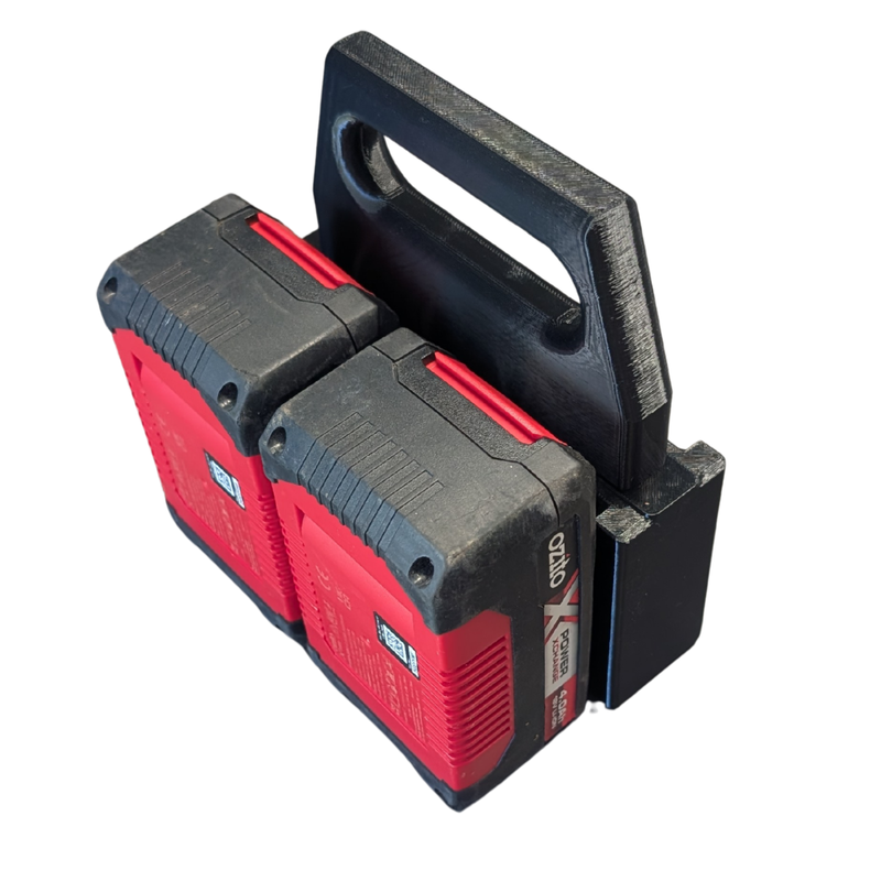 Black carry caddy for Ozito 18V PXC batteries, four-slot version and two fitted batteries shown from above.