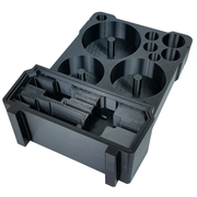 Black hole saw insert for a Milwaukee PACKOUT organiser, close-up of the hole saw recesses and accessory compartments.
