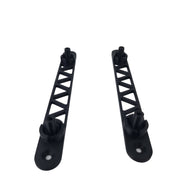 Two black metal brackets on a white background
