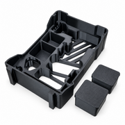Black M12 die grinder Packout insert with two removable lidded accessory boxes alongside