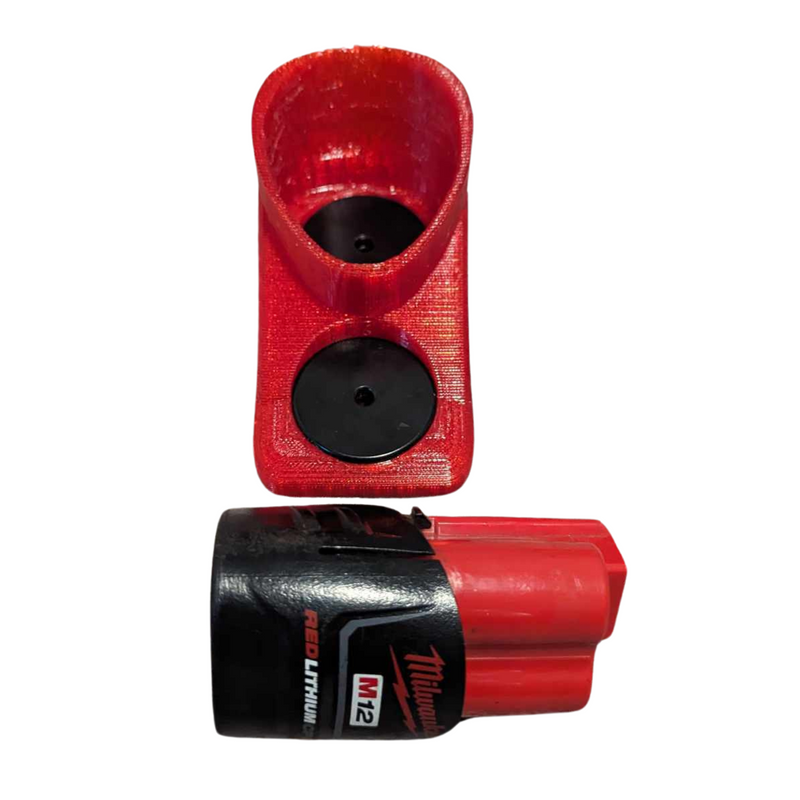 Milwaukee M18 battery pack with the soft TPU magnetic base cover fitted to its foot