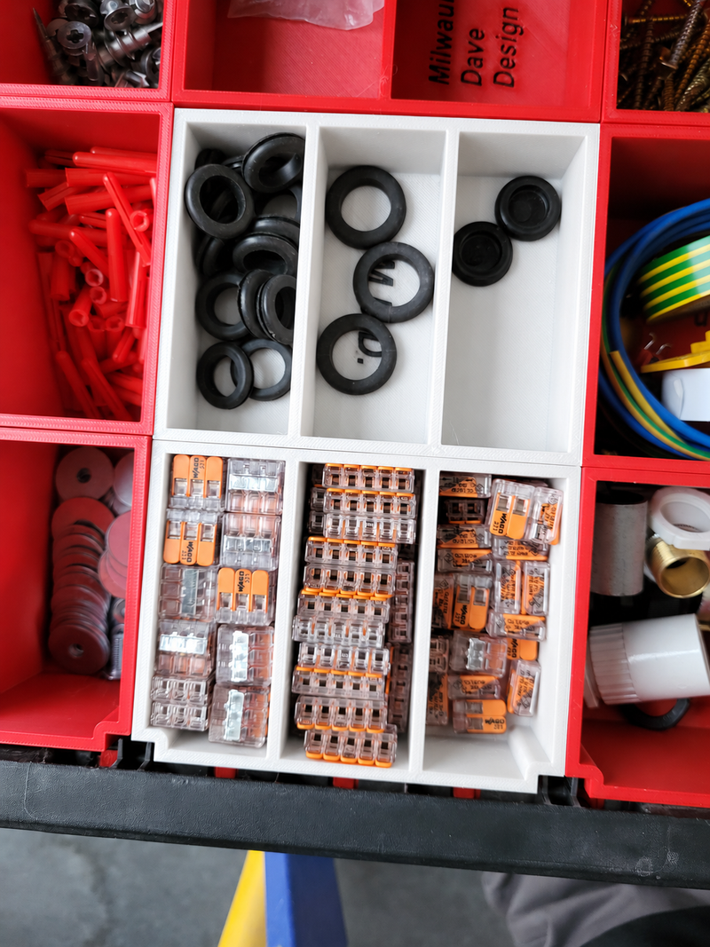 Centre six-compartment Packout drawer insert in white, shown with contents for demonstration