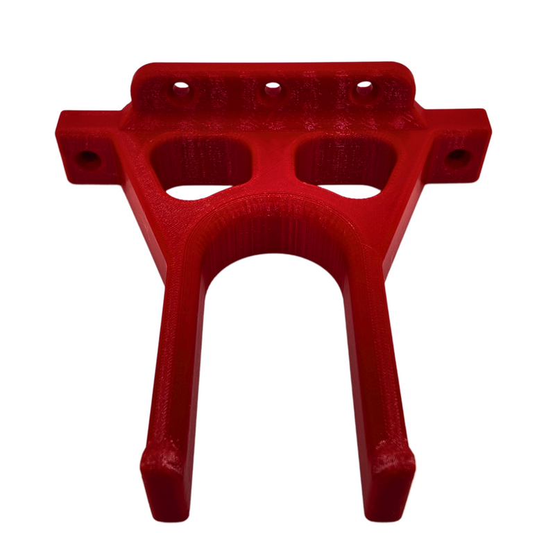 Wall mount for a Milwaukee M18 whipper snipper power head, red bracket viewed from above.